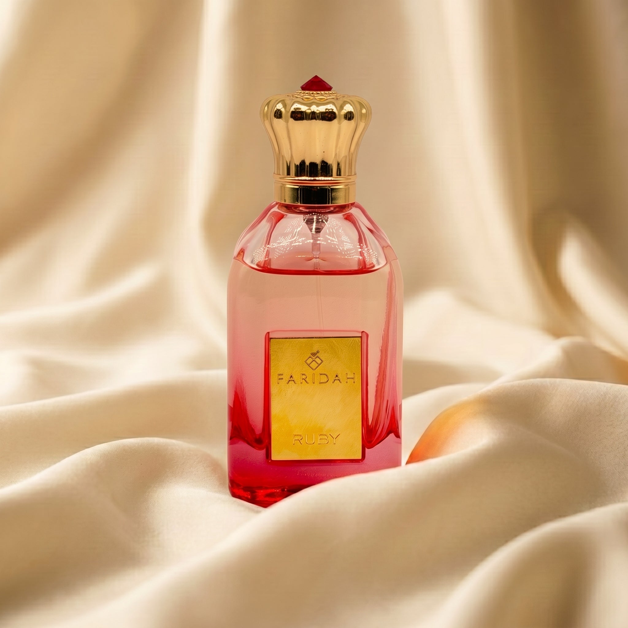 Ruby Gems Collection by Faridah luxury non-alcoholic perfume in red and gold bottle